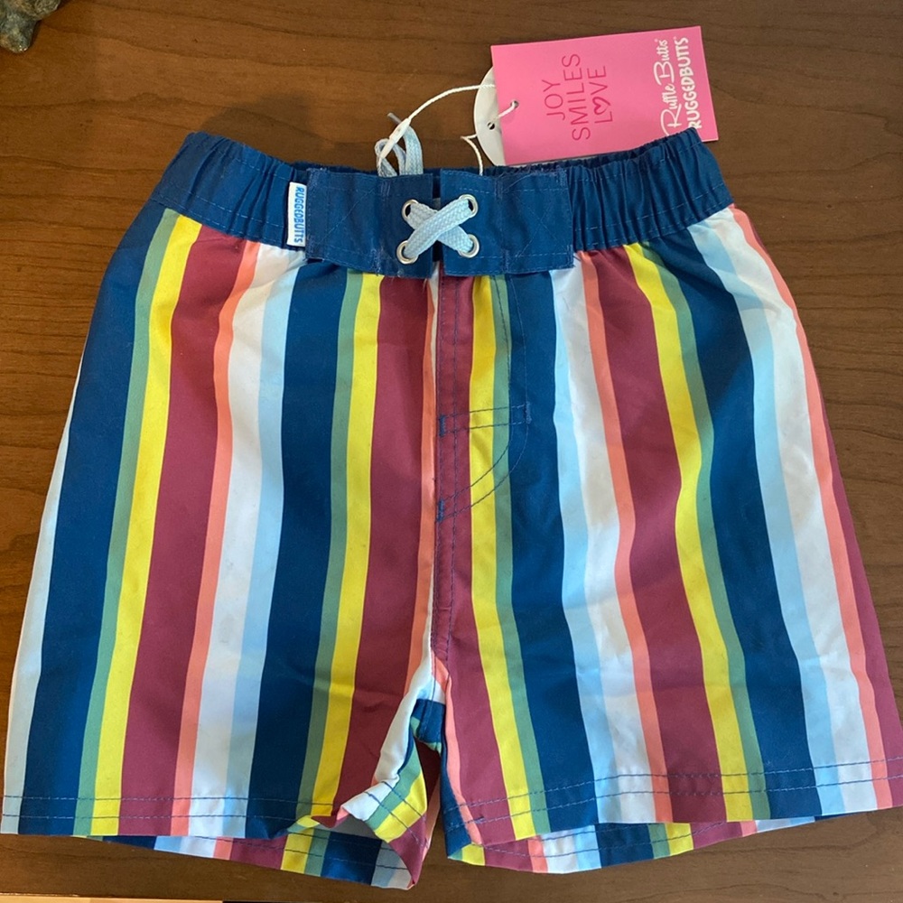NEW 2T boys swimsuit with striped rainbow pattern by Ruffle Butts